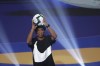FILE - Brazil's Ronaldinho Gaucho shows the official ball during the draw for the 2019 Copa America soccer tournament in Rio de Janeiro, Brazil, Thursday, Jan. 24, 2019. Brazil great Ronaldinho is launching a worldwide street soccer league to give talented young players an opportunity to showcase their skills and follow the same path to stardom as the former Barcelona player. (AP Photo/Andre Penner, File)