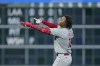 Philadelphia Phillies' Cristian Pache celebrates after hitting a RBI double against the Houston Astros during the fifth inning of a baseball game Friday, April 28, 2023, in Houston. (AP Photo/David J. Phillip)