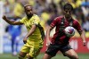 Nashville SC midfielder Hany Mukhtar (10) battles Atlanta United midfielder Santiago Sosa (5) for the ball during the first half of an MLS soccer match on Saturday, April 29, 2023, in Nashville, Tenn. (AP Photo/George Walker IV)