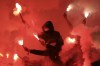 Fans hold flares during the French Cup final soccer match between Nantes and Toulouse, at the Stade de France in Saint-Denis, outside Paris, Saturday, April 29, 2023. (AP Photo/Aurelien Morissard)