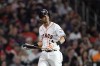Houston Astros' Mauricio Dubon walks back to the dugout after striking out to end the seventh inning of a baseball game against the Philadelphia Phillies Saturday, April 29, 2023, in Houston. (AP Photo/David J. Phillip)