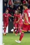 St. Louis City's Celio Pompeu (12) is congratulated by teammates after scoring against the Portland Timbers during the second half of an MLS soccer match Saturday, April 29, 2023, in St. Louis. (AP Photo/Scott Kane)