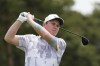 Robert MacIntyre of Scotland tees off on the fourth hole during the final round of the Korea Championship presented by Genesis at the Jack Nicklaus Golf Club Korea, in Incheon, South Korea, Sunday, April 30, 2023. (AP Photo/Lee Jin-man)