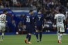 PSG's Lionel Messi and PSG's Kylian Mbappe walk on the pitch during the French League One soccer match between Paris Saint-Germain and Lorient, at the Parc des Princes stadium in Paris, Sunday, April 30, 2023. (AP Photo/Aurelien Morissard)
