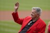 FILE - Mike Shannon waves as he is honored before the start of a baseball game between the St. Louis Cardinals and the Chicago Cubs, Oct. 3, 2021, in St. Louis. Shannon, a two-time World Series winner and longtime St. Louis Cardinals broadcaster, has died. He was 83. (AP Photo/Jeff Roberson, File)