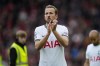 Tottenham's Harry Kane applauds fans after his team lost 4-3 at the end of an English Premier League soccer match between Liverpool and Tottenham Hotspur at Anfield stadium in Liverpool, Sunday, April 30, 2023. (AP Photo/Jon Super)