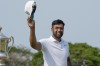 Tony Finau of the United States celebrates after winning the Mexico Open golf tournament in Puerto Vallarta, Mexico, Sunday, April 30, 2023. (AP Photo/Moises Castillo)