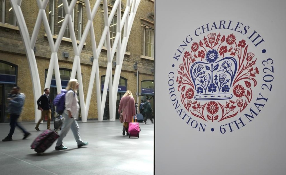 Canada’s major networks have kicked off a week of coronation coverage leading to Saturday’s historic crowning of King Charles III and Queen Consort, Camilla. A banner celebrating the coronation is displayed at Kings Cross Station in London, Monday, May 1, 2023. The coronation of King Charles III will take place at Westminster Abbey on May 6. THE CANADIAN PRESS/AP-Kirsty Wigglesworth