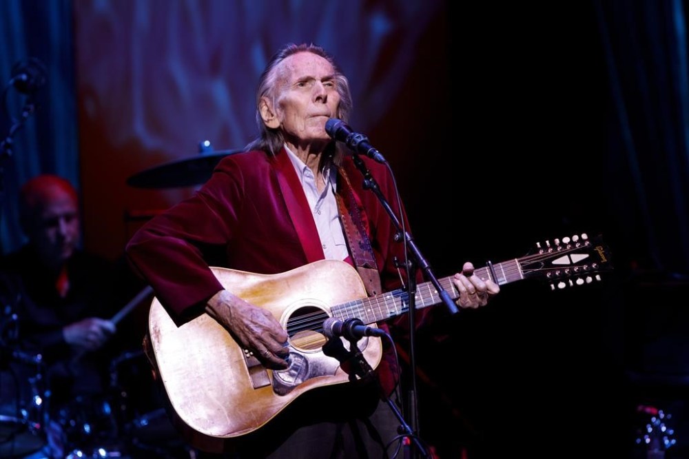 Gordon Lightfoot performs during the first concert at the newly re-opened Massey Hall in Toronto, Thursday, Nov. 25, 2021. The City of Orillia says Lightfoot was highly regarded in his hometown and had immense impact in his community and across Canada. THE CANADIAN PRESS/Cole Burston