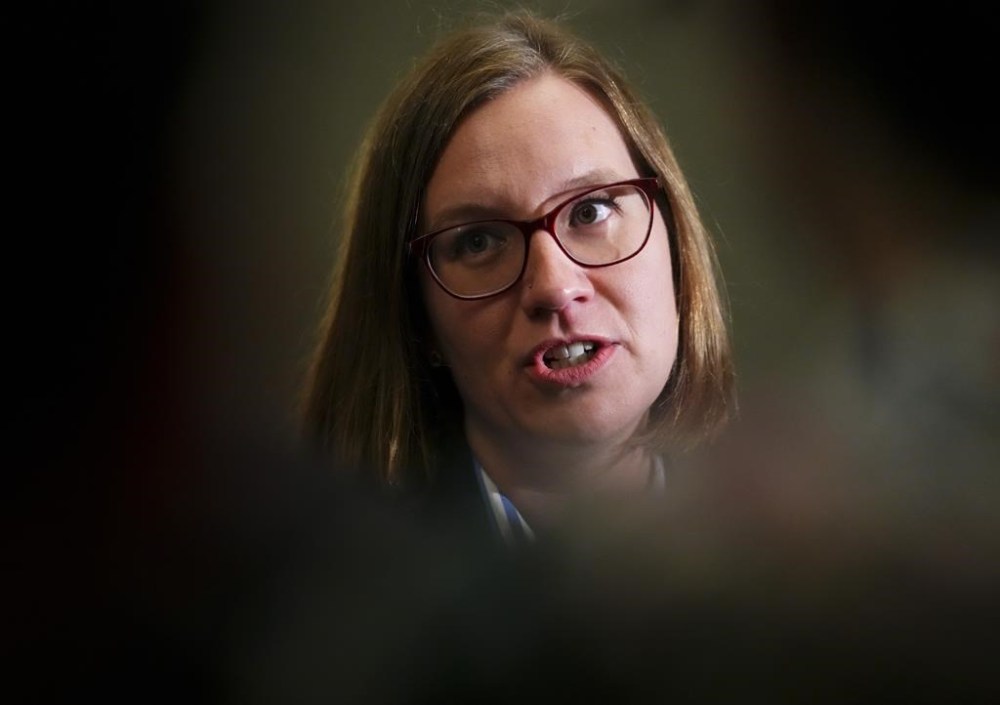 Families Minister Karina Gould arrives at a cabinet meeting on Parliament Hill in Ottawa on Tuesday, May 2, 2023. Gould is advising Canadians to expect long lines at passport offices this week as the public service resumes work following a 12-day strike. THE CANADIAN PRESS/Sean Kilpatrick