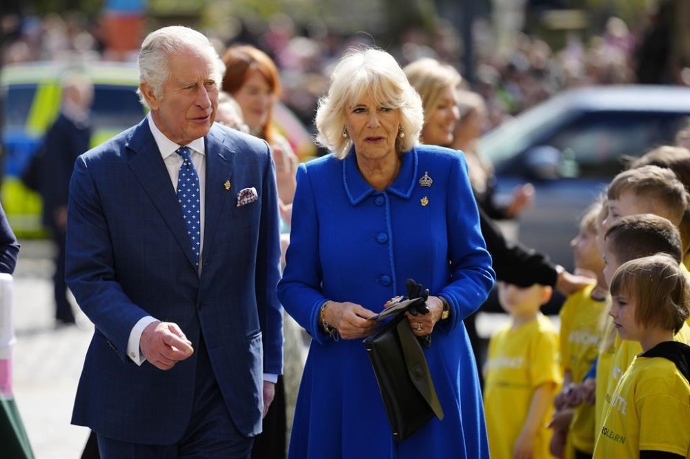 King Charles III and Queen Consort, Camilla arrive to visit Liverpool Central Library, to officially mark the Library's twinning with Ukraine's first public Library, the Regional Scientific Library in Odesa, in Liverpool, Wednesday, April 26, 2023. Canada’s major networks have kicked off a week of coronation coverage leading to Saturday’s historic crowning of King Charles III and Queen Consort, Camilla. THE CANADIAN PRESS/AP/Jon Super, pool