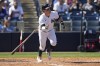 FILE - New York Yankees' Harrison Bader watches his RBI-triple against the Washington Nationals during the fourth inning of a spring training baseball game Wednesday, March 1, 2023, in Tampa, Fla. Bader was activated from the injured list by the New York Yankees, and the speedy center fielder could make his season debut Tuesday night, May 2, against the Cleveland Guardians. Diminished by injuries, the slumping Yankees hope Bader can spark their offense a bit. (AP Photo/David J. Phillip, File
