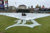 A tarp covers the Comerica Park field before a baseball game between the Detroit Tigers and the New York Mets, Tuesday, May 2, 2023, in Detroit. (AP Photo/\)