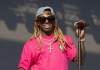 FILE - In this June 16, 2018, file photo, Lil Wayne performs on Day 3 of the 2018 Firefly Music Festival at The Woodlands in Dover, Del. Grammy Award-winning rapper Lil Wayne visited the World Series champion Houston Astros Tuesday, May 2, 2023 before their game against the San Francisco Giants. (Photo by Owen Sweeney/Invision/AP, File)