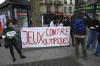 FILE - Activists against Paris 2024 display a banner reading 