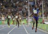 FILE - United States's Tori Bowie crosses the line to win the gold medal in the women's 4x100-meter relay final during the athletics competitions of the 2016 Summer Olympics at the Olympic stadium in Rio de Janeiro, Brazil, Friday, Aug. 19, 2016. Tori Bowie, the sprinter who won three Olympic medals at the 2016 Rio de Janeiro Games, has died, her management company and USA Track and Field said Wednesday, May 3, 2023. Bowie was 32. She was found Tuesday in her Florida home. No cause of death was given. (AP Photo/David J. Phillip, File)