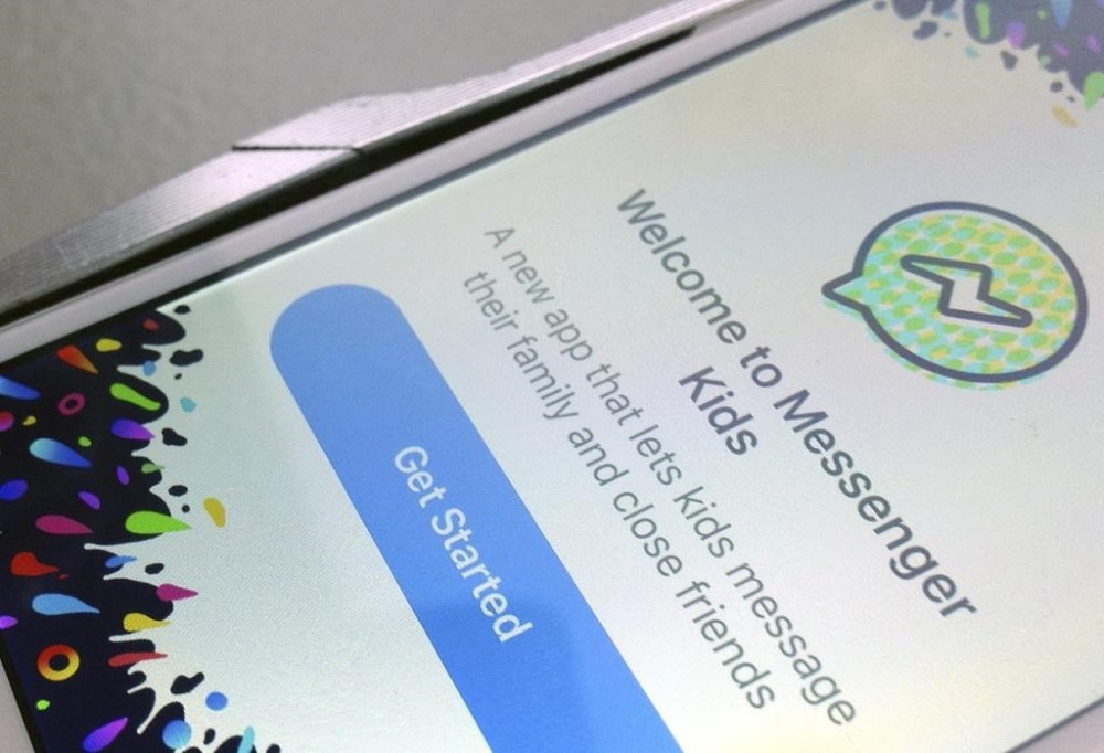 FILE - This photo shows the Facebook's Messenger Kids application on an iPhone in New York, Feb. 16, 2018. U.S. regulators say Facebook misled parents and failed to protect the privacy of children using its Messenger Kids app. The Federal Trade Commission says Facebook misrepresented the access it provided to app developers to private user data. As a result, the FTC on Wednesday, May 3, 2023 proposed sweeping changes to a 2020 privacy order with Facebook — now called Meta — that would prohibit it from profiting from data it collects on users under 18. (AP Photo/Jenny Kane, file)