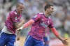 Juventus' Dusan Vlahovic, right, celebrates after scoring his side's second goal during a Serie A soccer match between Juventus and Lecce, at Turin's Allianz Stadium, Italy, Wednesday, May 3, 2023. (Tano Pecoraro/LaPresse via AP)