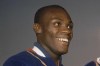FILE - Ralph Boston smiles on the podium at the Summer Olympics in Rome, Italy, Sept. 2, 1960. Ralph Boston, the Olympic long jump champion who broke Jesse Owens' record then later had his own mark eclipsed by Bob Beamon's record-shattering leap at the Mexico City Games, has died. He was 83. The U.S. Olympic and Paralympic Committee confirmed Boston died Sunday, April 30, 2023, at his home outside of Atlanta.(AP Photo/File)