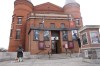 Staff outside the Orillia Opera House change signage to honour Gordon Lightfoot in Orillia, Ont., on Tuesday, May 2, 2023. A public visitation for Gordon Lightfoot has been set for Sunday in the folk singer-songwriter's Orillia, Ont., hometown. THE CANADIAN PRESS/Christopher Drost
