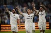 Marseille's players celebrates after winning the French League One soccer match between Marseille and Auxerre at the Velodrome stadium in Marseille, France, Sunday, April 30, 2023. Marseille won 2-1. (AP Photo/Daniel Cole)