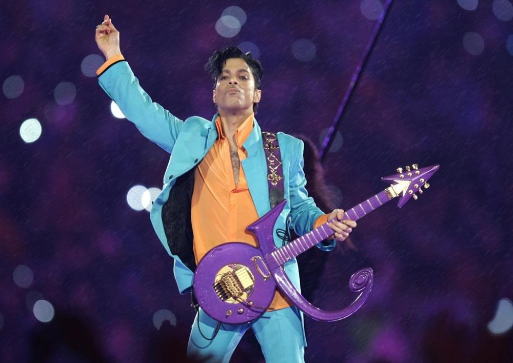 FILE - Prince performs during the halftime show at the Super Bowl XLI football game in Miami, Feb. 4, 2007. The late pop superstar Prince will have a highway named after him, thanks to Minnesota lawmakers who voted Thursday, May 4, 2023, to dedicate the highway that runs past his Paisley Park museum and studios to the creator of hits including
