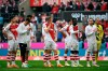 Cologne's players stand on the pitch after the German Bundesliga soccer match between 1. FC Cologne and SC Freiburg in Cologne, Germany, Saturday, April 29, 2023. (Federico Gambarini/dpa via AP)