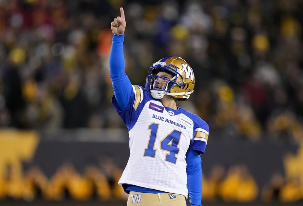 Winnipeg Blue Bombers kicker Sergio Castillo (14) celebrates a field goal against the Hamilton Tiger-Cats during second half football action in the 108th CFL Grey Cup in Hamilton, Ont., on Sunday, December 12, 2021. THE CANADIAN PRESS/Nathan Denette