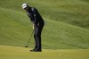 Corey Conners, of Canada, putts from off the green on the 14th hole during first round of the Wells Fargo Championship golf tournament at the Quail Hollow Club on Thursday, May 4, 2023, in Charlotte, N.C. (AP Photo/Chris Carlson)