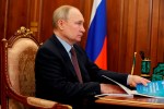 Russian President Vladimir Putin listens to Russian Economic Development Minister Maxim Reshetnikov during their meeting at the Kremlin in Moscow, Russia, Thursday, May 4, 2023. THE CANADIAN PRESS/AP-Klimentyev, Sputnik, Kremlin Pool Photo via AP