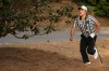 Kyoung-Hoon Lee, of South Korea, watches his shot from the pine straw on the ninth hole during second round of the Wells Fargo Championship golf tournament at the Quail Hollow Club on Friday, May 5, 2023, in Charlotte, N.C. (AP Photo/Chris Carlson)