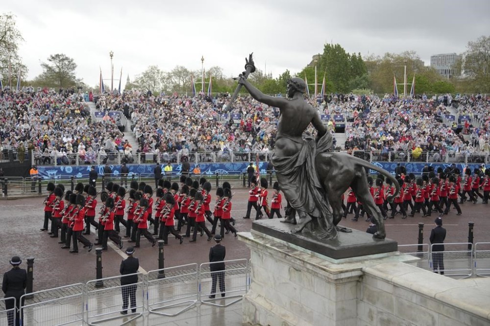 Foot Guards march at the Mall in preparation for the coronation ceremony for Britain's King Charles III in London Saturday, May 6, 2023. (AP Photo/Vadim Ghirda)