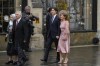 Canadian Prime Minister Justin Trudeau, center left, and Sophie Trudeau arrive at Westminster Abbey prior to the coronation ceremony of Britain's King Charles III in London Saturday, May 6, 2023. (AP Photo/Alessandra Tarantino)