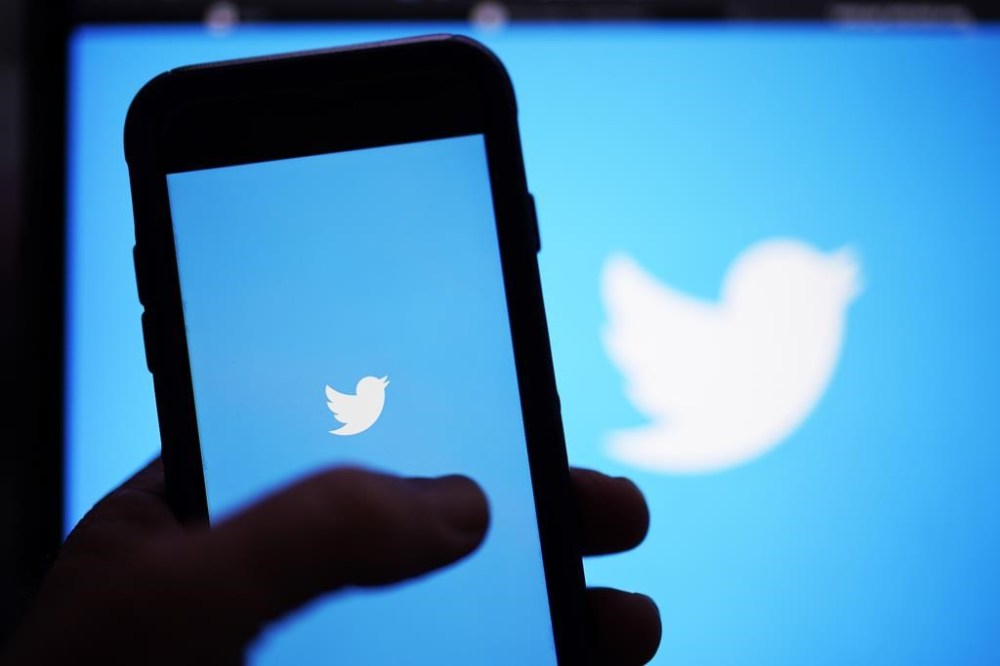 FILE - The Twitter application is seen on a digital device, April 25, 2022, in San Diego. Election administrators across the U.S. say they’re concerned their offices will be targeted for fake Twitter accounts that will confuse or mislead voters after the social media platform altered its long-standing verification service. Some are trying to take steps to ensure that voters can tell the difference between the official election office account and any impostors that might pop up in elections this year or during the 2024 cycle. (AP Photo/Gregory Bull, File)