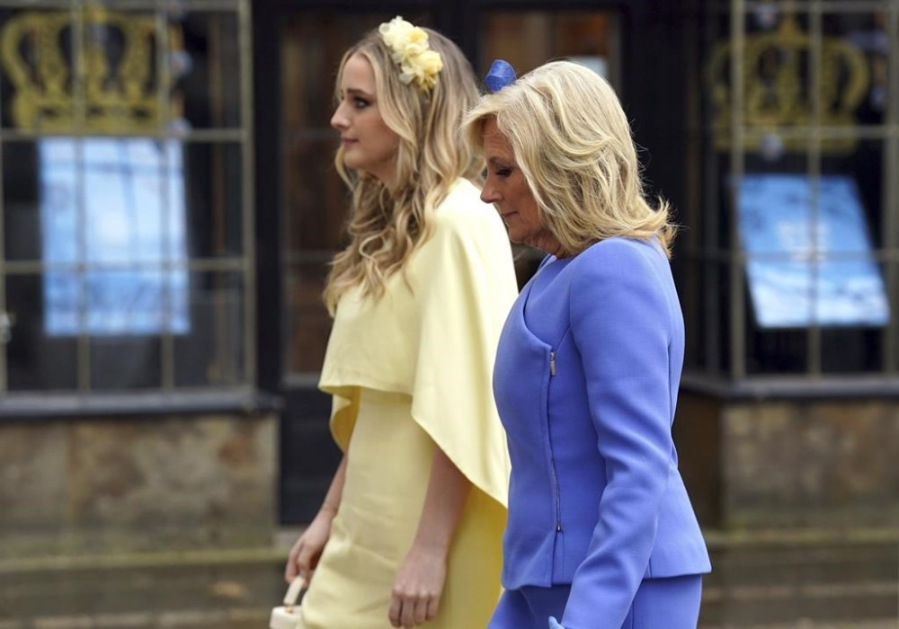 US First Lady Jill Biden and her granddaughter Finnegan arrive at Westminster Abbey ahead of the coronation of King Charles III and Camilla, the Queen Consort, in London, Saturday, May 6, 2023. (Andrew Milligan/Pool via AP)