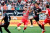 Augsburg's Maximilian Bauer, left, and Berlin's Janik Haberer in action during a German Bundesliga soccer match between FC Augsburg and Union Berlin in Augsburg, Germany, Saturday, May 6, 2023. (Daniel Loeb/dpa via AP)