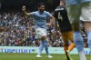 Manchester City's Ilkay Gundogan scores his side's 2nd goal during the English Premier League soccer match between Manchester City and Leeds United at Etihad stadium in Manchester, England, Saturday, May 6, 2023. (AP Photo/Rui Vieira)