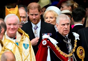 Britain's Prince Harry, Duke of Sussex, and Prince Andrew leave Westminster Abbey following the coronation ceremony of Britain's King Charles and Queen Camilla, in London, Saturday, May 6, 2023. (Toby Melville, Pool via AP)