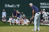 Brendon Todd watches his putt on the 18th hole during third round of the Wells Fargo Championship golf tournament at the Quail Hollow Club on Saturday, May 6, 2023, in Charlotte, N.C. (AP Photo/Erik Verduzco)