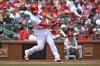 St. Louis Cardinals' Willson Contreras hits a two-run double in the first inning of a baseball game against the Los Angeles Angels, Thursday May 4, 2023, in St. Louis. (AP Photo/Joe Puetz)