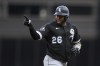 Chicago White Sox's Hanser Alberto points to the dugout as he runs the bases after hitting a solo home run during the second inning of a baseball game against the Cincinnati Reds in Cincinnati, Saturday, May 6, 2023. (AP Photo/Aaron Doster)