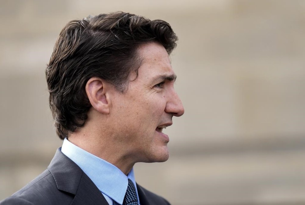 Canadian Prime Minister Justin Trudeau speaks with the media in London on Sunday, May 7, 2023. THE CANADIAN PRESS/Nathan Denette
