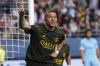 PSG's Kylian Mbappe celebrates after scoring his side's opening goal during the French League One soccer match between Troyes and Paris Saint Germain, at the Stade de l'Aube, in Troyes, France, Sunday, May 7, 2023. (AP Photo/Lewis Joly)