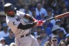 Miami Marlins designated hitter Jorge Soler hits a one-run single against the Chicago Cubs during the eighth inning of a baseball game in Chicago, Sunday, May 7, 2023. (AP Photo/Nam Y. Huh)