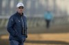 Trainer Todd Pletcher watches a workout at Churchill Downs Tuesday, May 2, 2023, in Louisville, Ky. The 149th running of the Kentucky Derby is scheduled for Saturday, May 6. (AP Photo/Charlie Riedel)