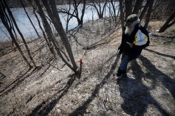 Herman Holla said he and another man discovered the human remains in a wooded section of riverbank near Curtis Street and Higgins Avenue at about 1:30 p.m. (John Woods / Winnipeg Free Press)