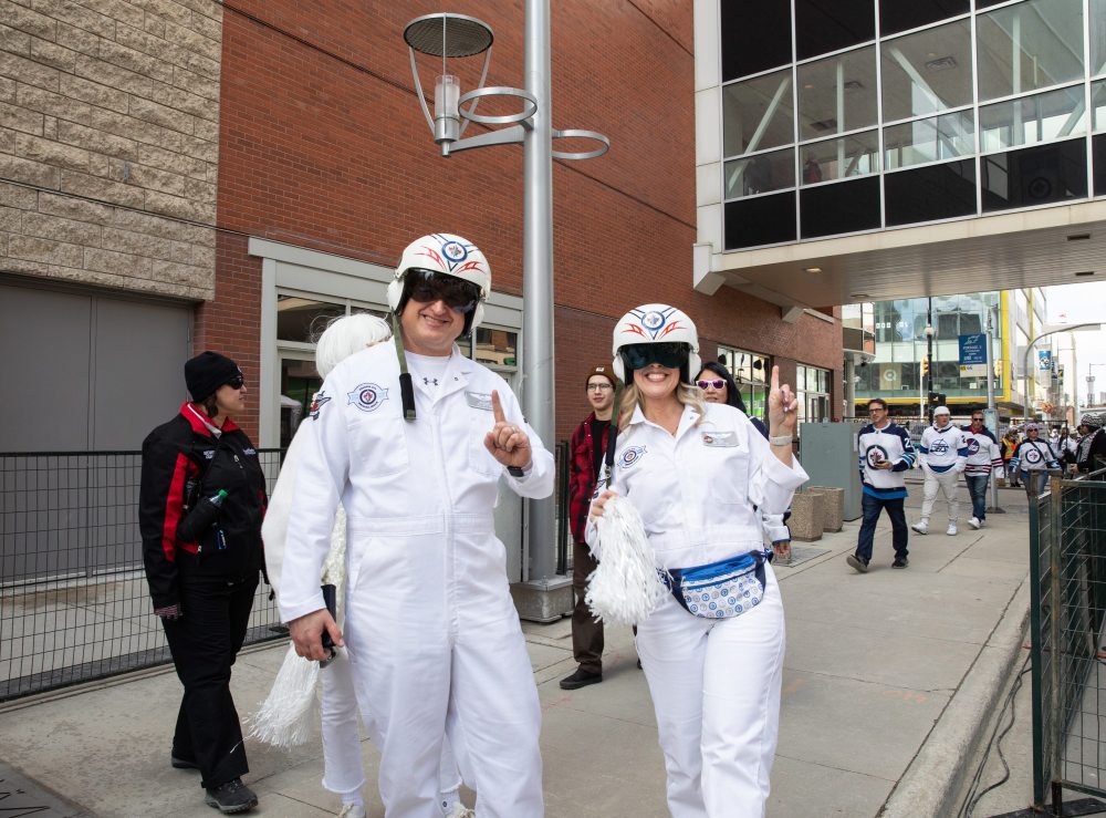 JESSICA LEE / WINNIPEG FREE PRESS
Dave and Colleen Kramer are photographed joining the Whiteout party. Thousands of Winnipeg Jets fans gathered downtown beside Canada Life Centre April 22, 2023 to watch the Jets play against the Golden Knights.