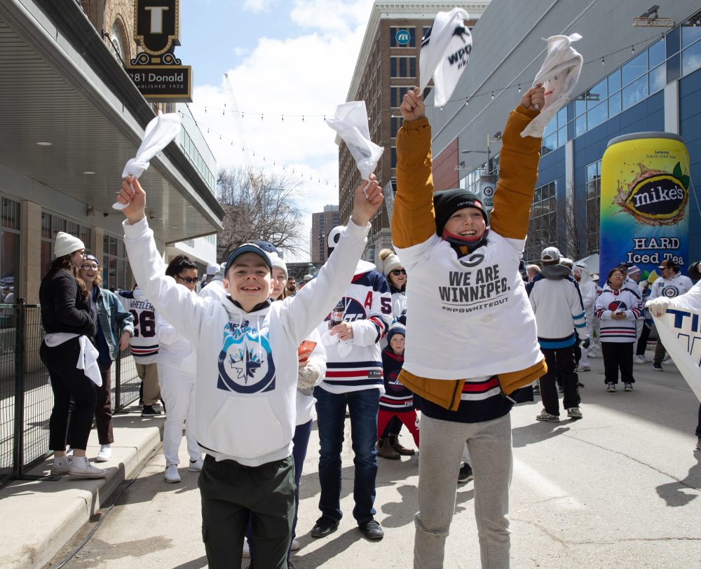 JESSICA LEE / WINNIPEG FREE PRESS
Hugo Cordorva (left) and Owen Davies are photographed cheering during a Whiteout party. Thousands of Winnipeg Jets fans gathered downtown beside Canada Life Centre April 22, 2023 to watch the Jets play against the Golden Knights.