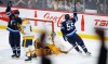 JOHN WOODS / THE CANADIAN PRESS
Winnipeg Jets' Mark Scheifele's (55) scores on Nashville Predators goaltender Juuse Saros (74) as Spencer Stastney (81) defends against Neal Pionk (4) during second period NHL action in Winnipeg, Saturday, April 8, 2023.
