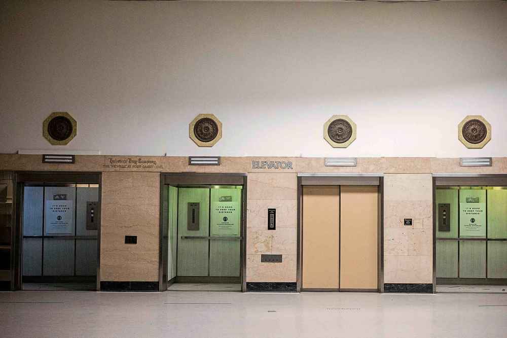 The elevators on the main floor at The Bay, now empty and shuttered.